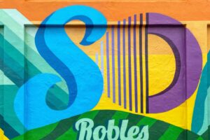 green and yellow wooden board Paso Robles Mural